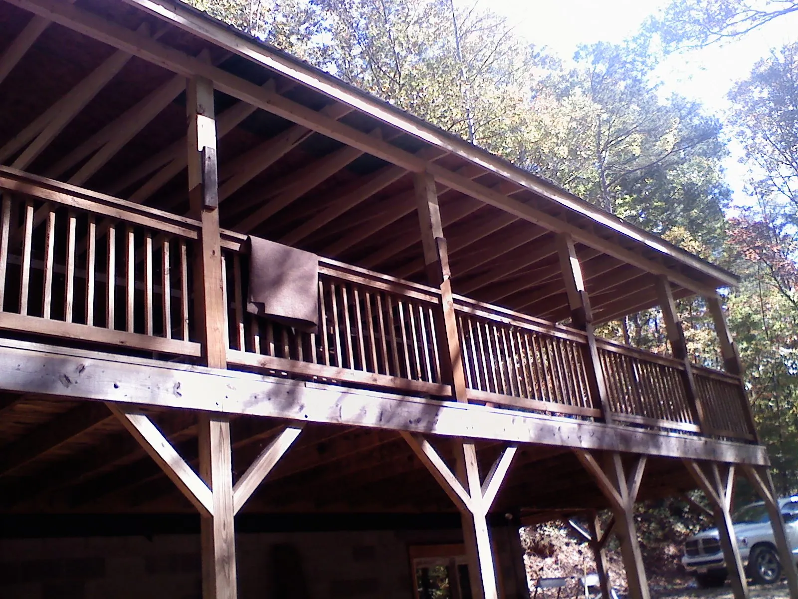 Timber framing under a new elevated porch and deck — Roof Leak Repair in Boulevard by Roofing Brothers